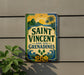 A vintage-style sign for Saint Vincent and the Grenadines, featuring a tropical landscape with palm trees and a sun.