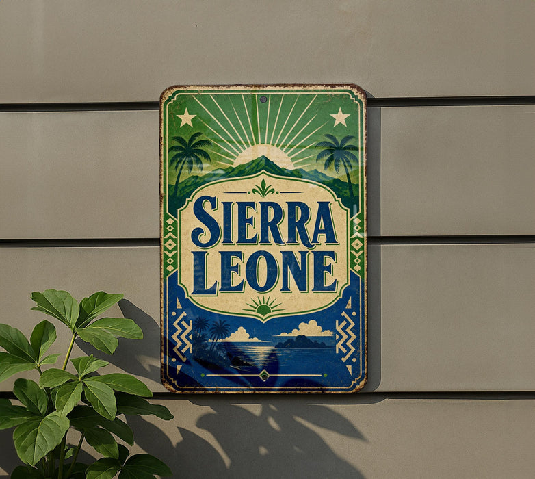 A vintage-style sign for Sierra Leone, featuring palm trees, mountains, and a sun-like design, mounted on a wall.