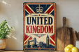 A vintage-style sign that reads "UNITED KINGDOM" with a depiction of Big Ben and the British flag in the background.