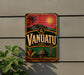 a vintage-style sign for Vanuatu, with a tropical landscape and palm trees depicted on the sign.