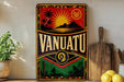 a vintage-style sign with the word "VANUATU" prominently displayed, surrounded by tropical imagery and symbols.