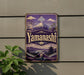 A vintage-style sign with the word "Yamashishi" prominently displayed, featuring a mountain landscape and a pagoda in the background.