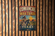 a vintage metal sign with a cowboy on horseback, mounted on a wooden wall.