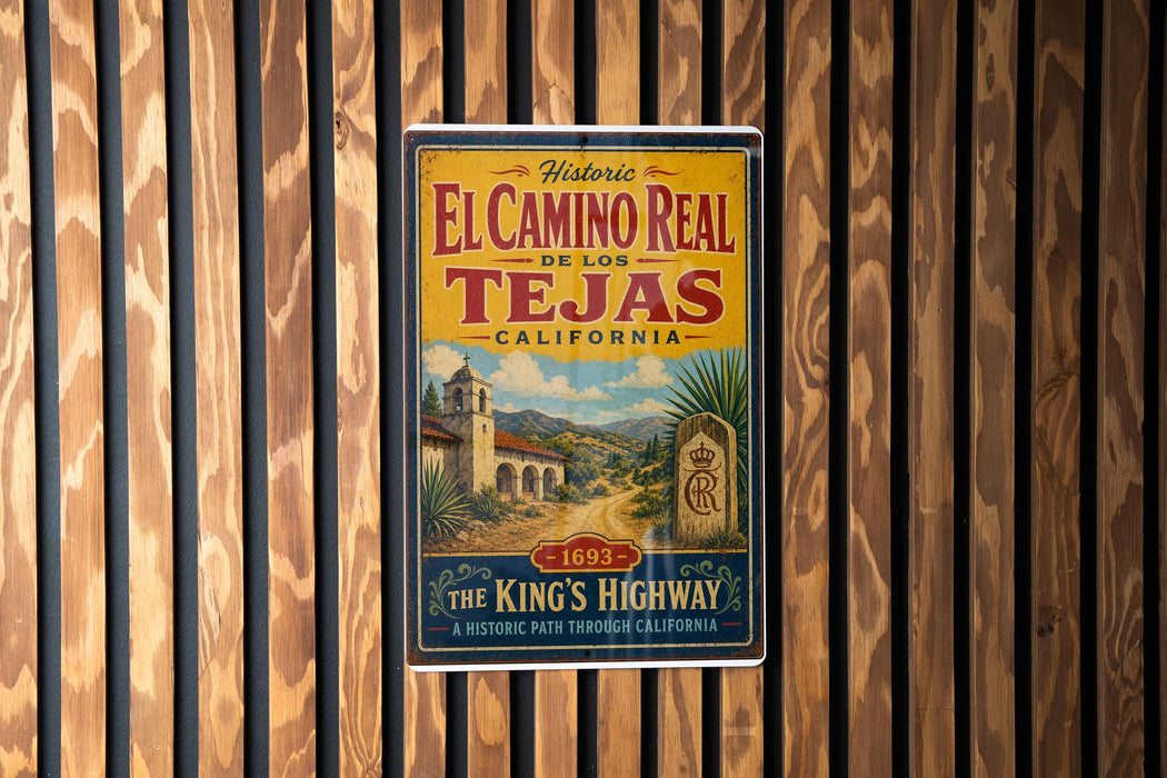 A vintage-style poster advertising the historic El Camino Real in Los Tejas, California, featuring a scenic illustration of a road leading to a church and palm trees.