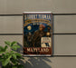 A vintage-style metal sign with the title "Harriet Tubman Underground Railroad by way" and an illustration of a woman holding a lantern. The sign is mounted on a wall, and there is a plant to the left of the sign.