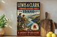 A vintage-style metal sign for the Lewis and Clark National Historic Trail in Idaho, featuring two figures in period clothing and a scenic landscape.