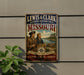 A vintage-style metal sign for the Lewis & Clark National Historic Trail in Missouri, featuring an illustration of two men exploring a river with a compass.