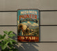 A vintage-style sign for the Mormon Pioneer National Historic Trail in Utah, featuring a wagon and a couple of people in a historical setting.