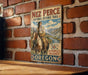 a vintage-style metal sign with a picture of a Native American man riding a horse, mounted on a brick wall.