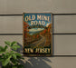 a vintage-style sign for the Old Mine Road in New Jersey, which is a scenic historic and beautiful road.
