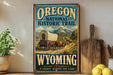 A vintage-style sign for the Oregon National Historic Trail, featuring a wagon train traveling through a scenic landscape with mountains in the background.