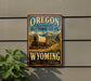 A vintage-style sign for the Oregon National Historic Trail, featuring a wagon train and mountains in the background.