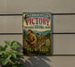 a vintage-style metal sign with a historical theme, mounted on a wall next to a plant.