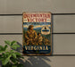 a vintage metal sign for the Overmountain Victory National Historic Trail in Virginia, with a depiction of a group of people on a trail.