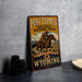 A vintage-style metal sign advertising Pony Express National Historic Trail, featuring a cowboy riding a horse and the text "The mail must go through Wyoming".