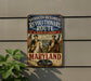 A vintage-style metal sign with the text "WASHINGTON-ROCKAMBEAU REVOLUTIONARY ROUTE A PATH TO LIBERTY MARYLAND Step into HISTORY" displayed on a wall.