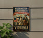 A vintage-style metal sign with the text "WASHINGTON ROCCHAMBEAU REVOLUTIONARY ROUTE VIRGINIA" and images of two men on horseback, one wearing a military uniform and the other a civilian, against a backdrop of an American flag.