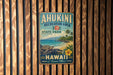 A vintage metal sign for the Ahukini Recreation Area in Hawaii, featuring a beach scene with a turtle and palm trees.