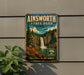 A vintage-style metal sign for Ainsworth State Park in Oregon, featuring a waterfall and forest landscape.