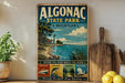 A vintage-style sign for Algonac State Park in Michigan, featuring illustrations of a lighthouse, pine trees, and a lake, along with text promoting various activities such as boating, fishing, hiking, and relaxing.