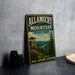 A vintage metal sign for Allamuchy Mountain State Park, featuring a scenic illustration of the park and its surroundings.