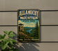 A vintage metal sign for Allamuchy Mountain State Park, featuring a scenic mountain landscape and a tower, is displayed on a wall.