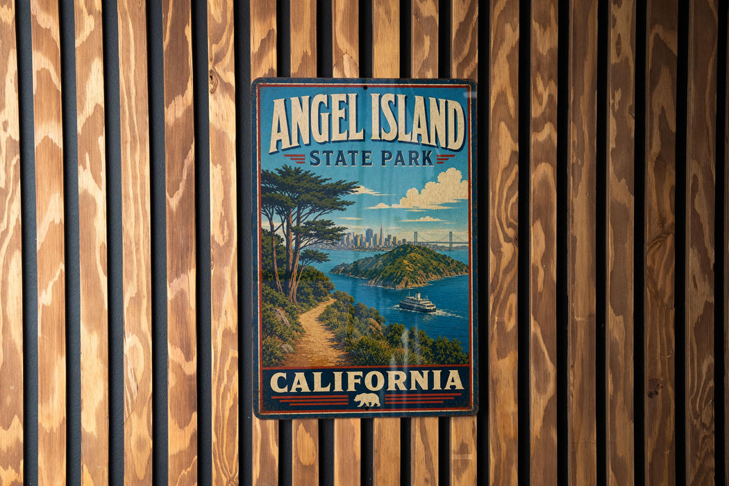 A vintage-style metal sign for Angel Island State Park in California, featuring a scenic landscape with a path leading to the park.