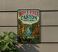 A vintage-style sign for Apple River Canyon State Park in Illinois, featuring a scenic illustration of the canyon and its surroundings.