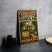 A vintage-style metal sign for Arbor Lodge State Historical Park in Nebraska, featuring an illustration of a lodge surrounded by trees and a sign that reads "Established 1971".