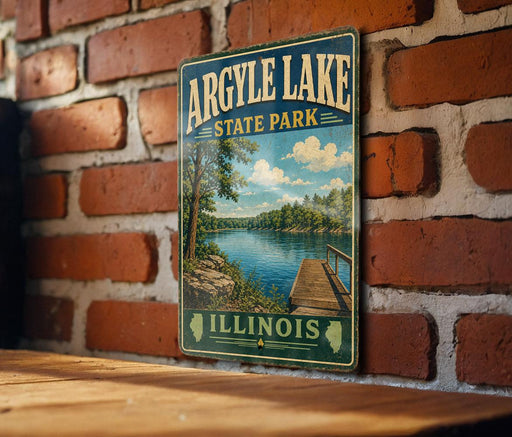 A vintage-style metal sign for Argyle Lake State Park in Illinois, featuring a scenic image of the lake and surrounding landscape.