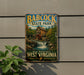 A vintage-style metal sign for Babcock State Park in West Virginia, featuring a scenic image of a mill and waterfall.