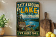 A vintage-style metal sign for Battleground Lake State Park in Washington, featuring a scenic image of the lake and mountains.