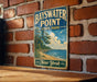 A vintage-style metal sign for Bayswater Point State Park in New York, featuring a scenic landscape with a beach, trees, and a body of water.