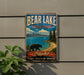 A vintage-style sign for Bear Lake State Park in Idaho, featuring a bear and a scenic landscape.