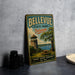 A vintage-style sign for Bellevue State Park in Delaware, featuring a scenic image of a lighthouse and a picnic table overlooking a lake.