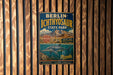 A vintage metal sign for Berlin-Ichthyosaur State Park, featuring an illustration of a sea dinosaur and the text "Berlin-Ichthyosaur State Park" and "Nebraska" at the bottom.