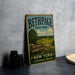 A vintage-style metal sign for Bethpage State Park, featuring an illustration of a golf course and the text "The people's country club New York Adventure Awaits".