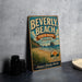 A vintage-style metal sign for Beverly Beach State Park in Oregon, featuring a beach scene and the text "Discover the Oregon Coast".