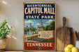 A vintage-style sign for the historic Capitol Mall State Park in Tennessee, featuring a cityscape and a fountain.