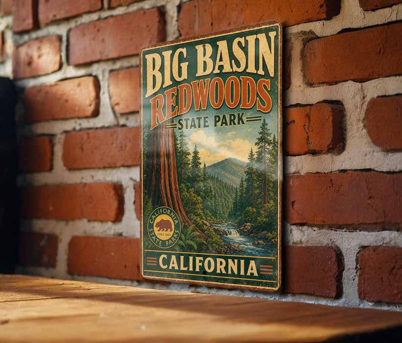 A vintage-style metal sign for Big Basin Redwoods State Park in California, featuring a scenic illustration of the park's landscape.