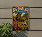 a vintage-style metal sign with a depiction of a large elephant and a bear, along with the text "Big Bone Lick State Historic Site" and "Kentucky".