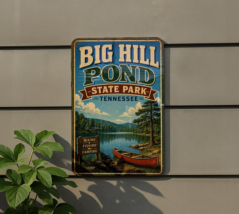 A vintage-style sign for Big Hill Pond State Park in Tennessee, featuring a scenic image of a lake, forest, and canoe.