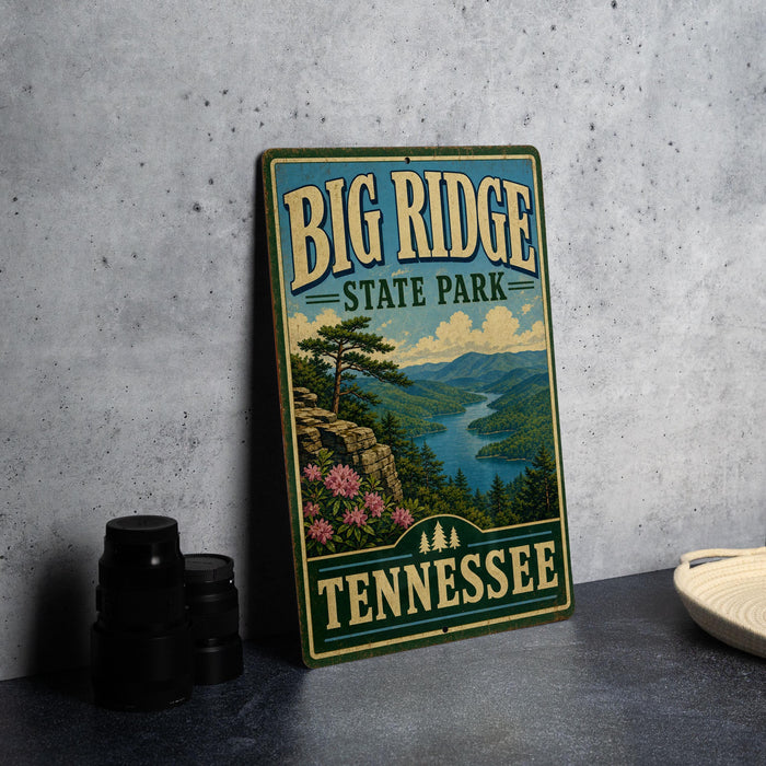 A vintage-style sign for Big Ridge State Park in Tennessee, featuring a scenic landscape with mountains, a river, and pine trees.
