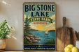 A vintage-style sign for Big Stone Lake State Park in Minnesota, featuring a scenic illustration of a lake, mountains, and a sailboat.