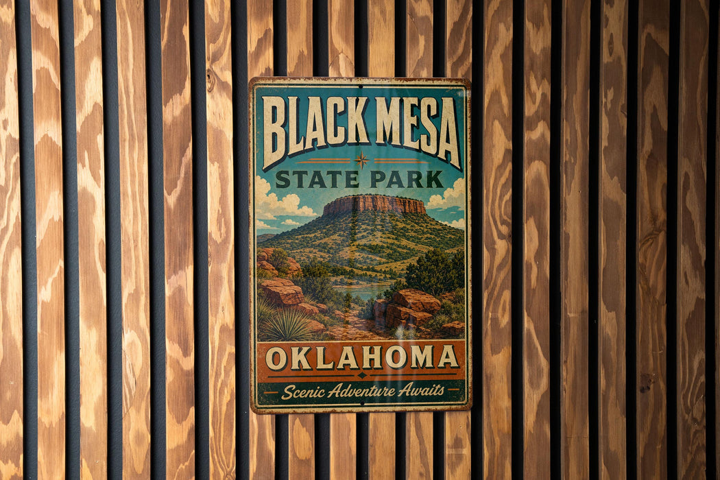 A vintage metal sign for Black Mesa State Park in Oklahoma, featuring a scenic mountain landscape.