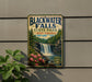 A vintage-style sign for Blackwater Falls State Park in West Virginia, featuring a scenic image of the waterfall surrounded by pine trees and pink flowers.