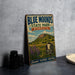 A vintage-style sign for Blue Mounds State Park in Minnesota, featuring a scenic landscape with a mountain and wildflowers.