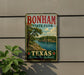 A vintage-style metal sign for Bonham State Park in Texas, featuring a scenic landscape with a river and trees.