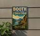 A vintage-style sign for the Booth State Scenic Corridor in Oregon, featuring a scenic mountain landscape with a winding road.