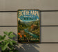 A vintage-style metal sign for Bothe Napa Valley State Park in California, featuring a scenic image of a river, mountains, and a wooden mill.
